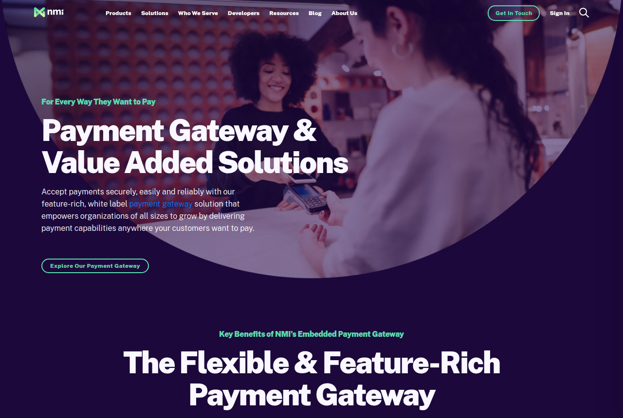 NMI payment gateway product page header with its navigation and the Talk to Our Team button